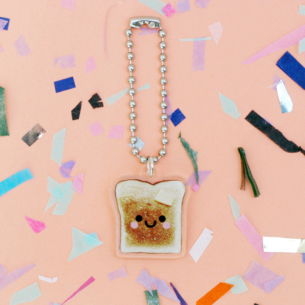 Toast acrylic keychain happy face by hannahdoodle