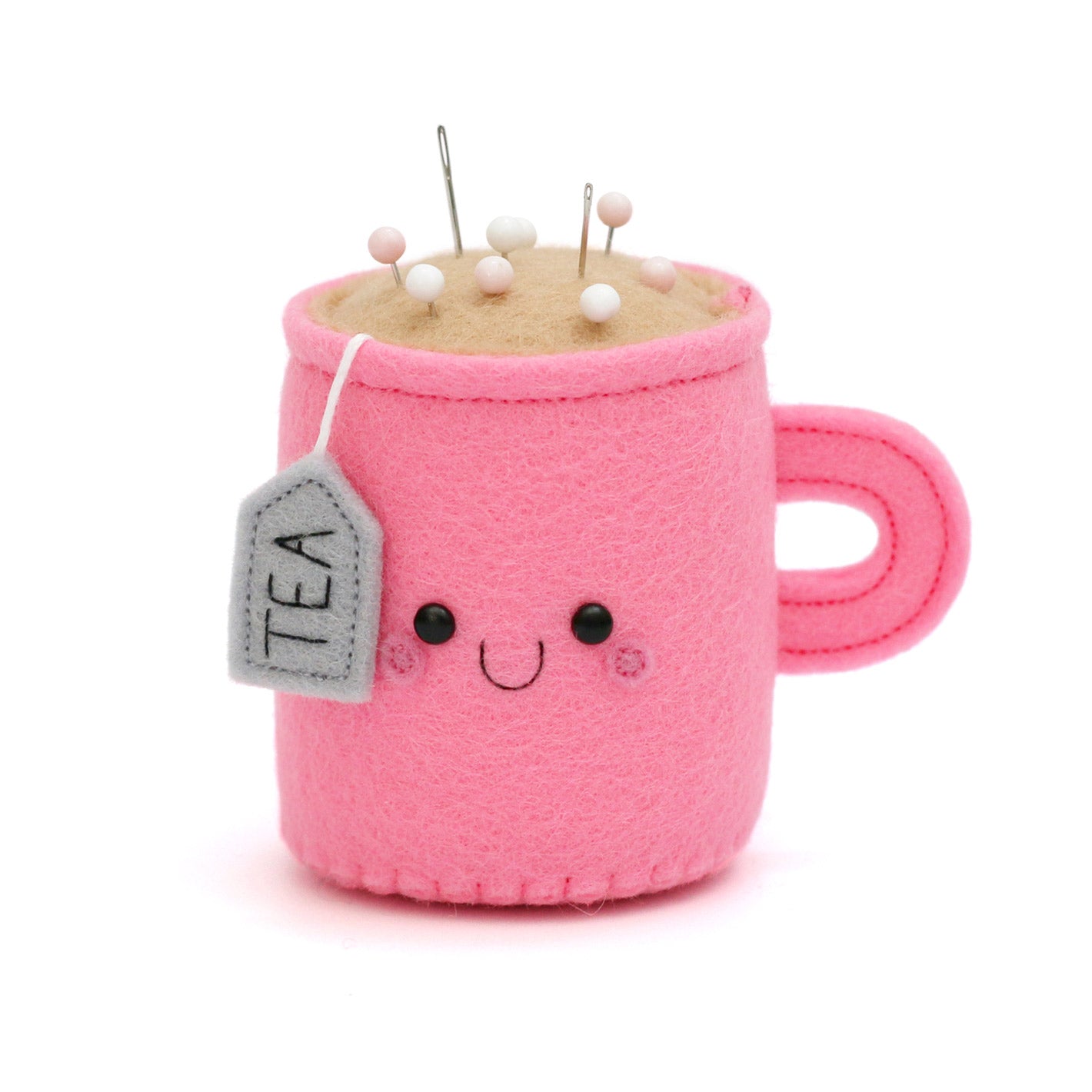 Bright pink teacup pincushion
