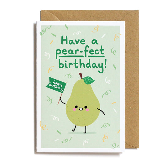 Greeting card with a cartoon pear holding a 'happy birthday' flag on a light green background.