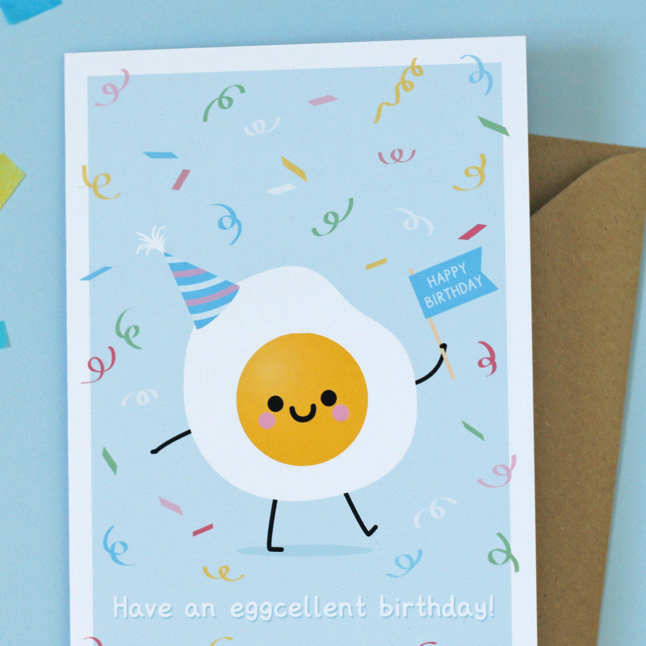 Greeting card featuring a cute fried egg, blue birthday card made in the UK