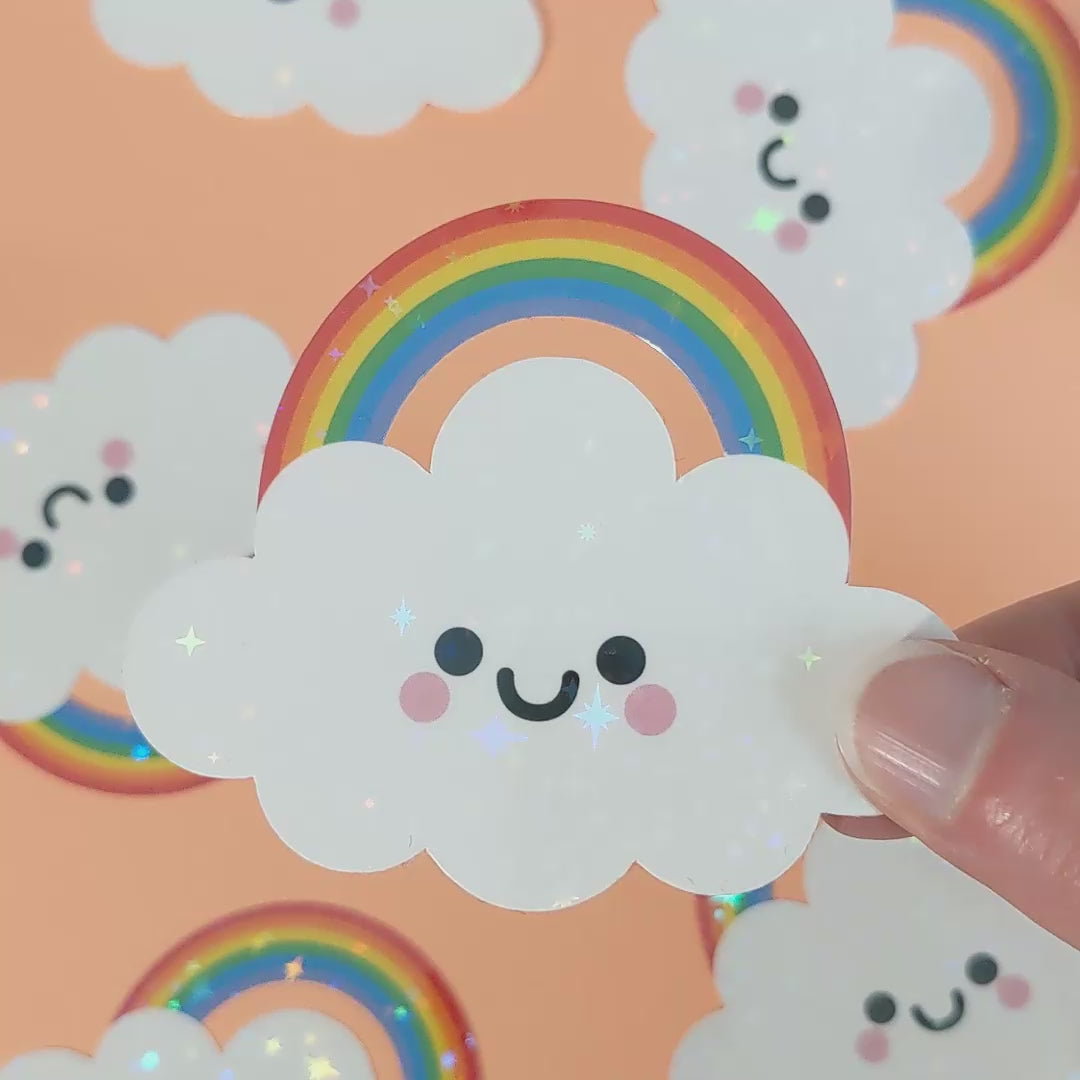 Kawaii Rainbow Cloud Holographic Sticker by hannahdoodle with starry holographic overlay