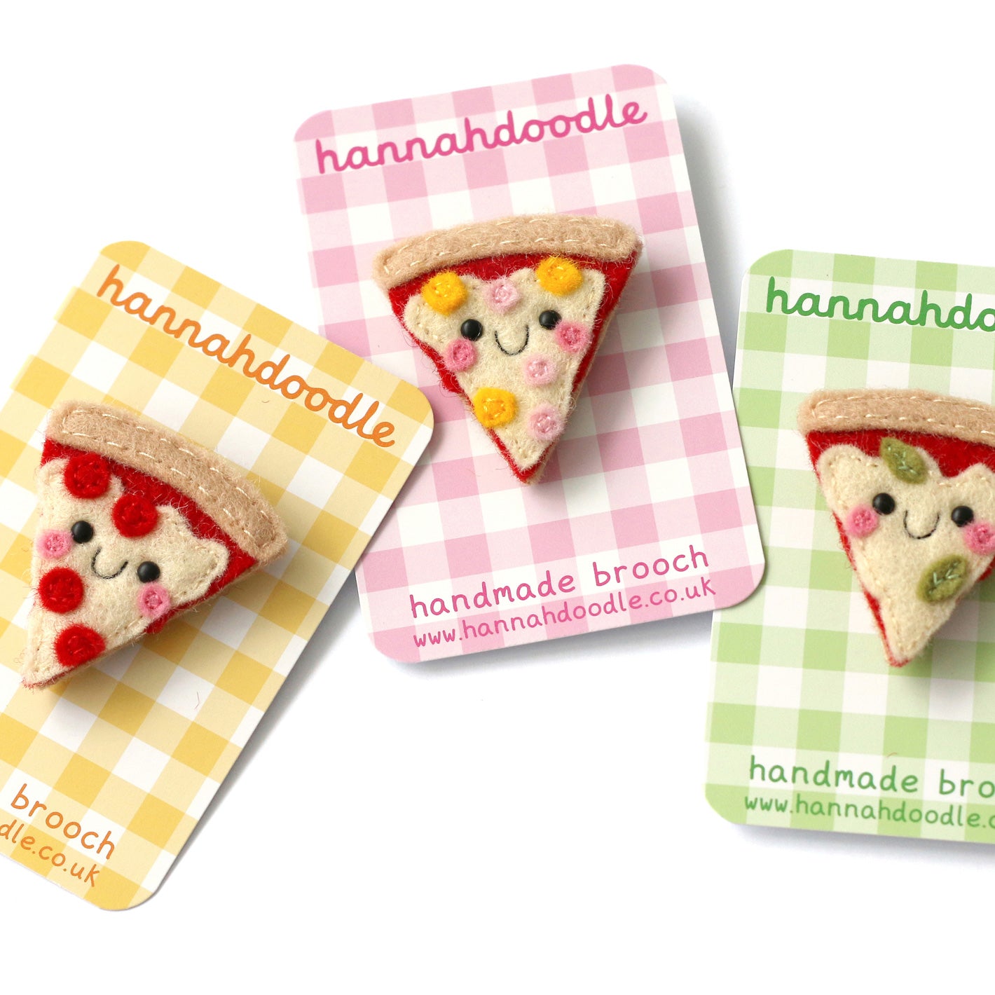 pizza brooches on backing cards
