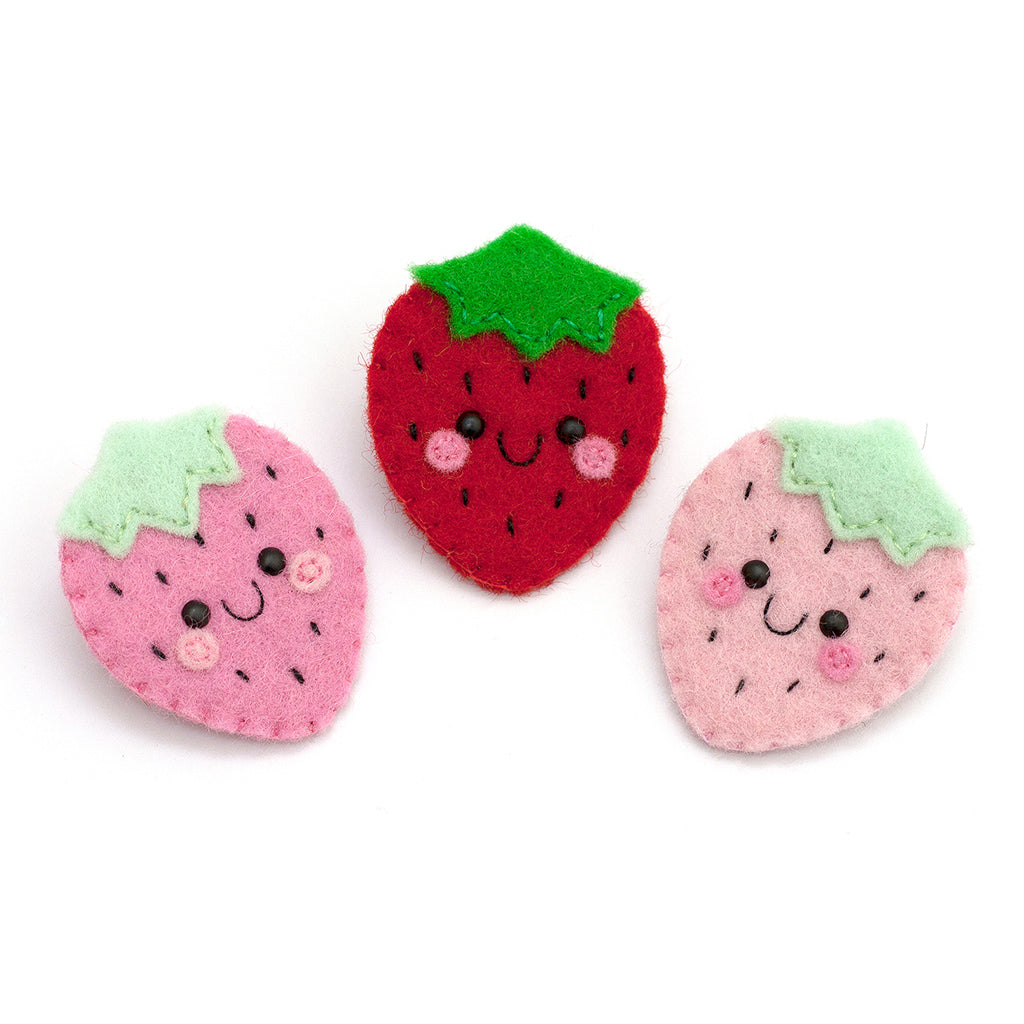 Strawberry felt brooches by hannahdoodle